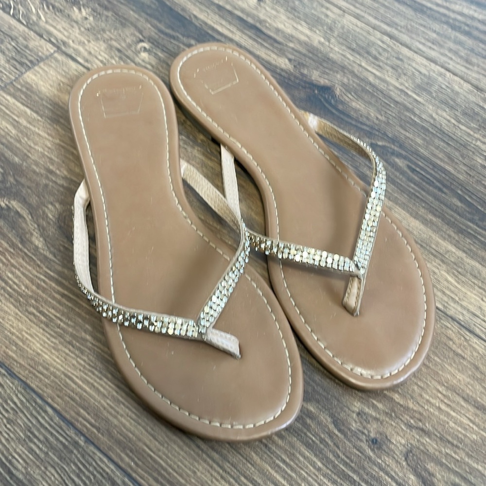 Women’s gold flip flops Size 11